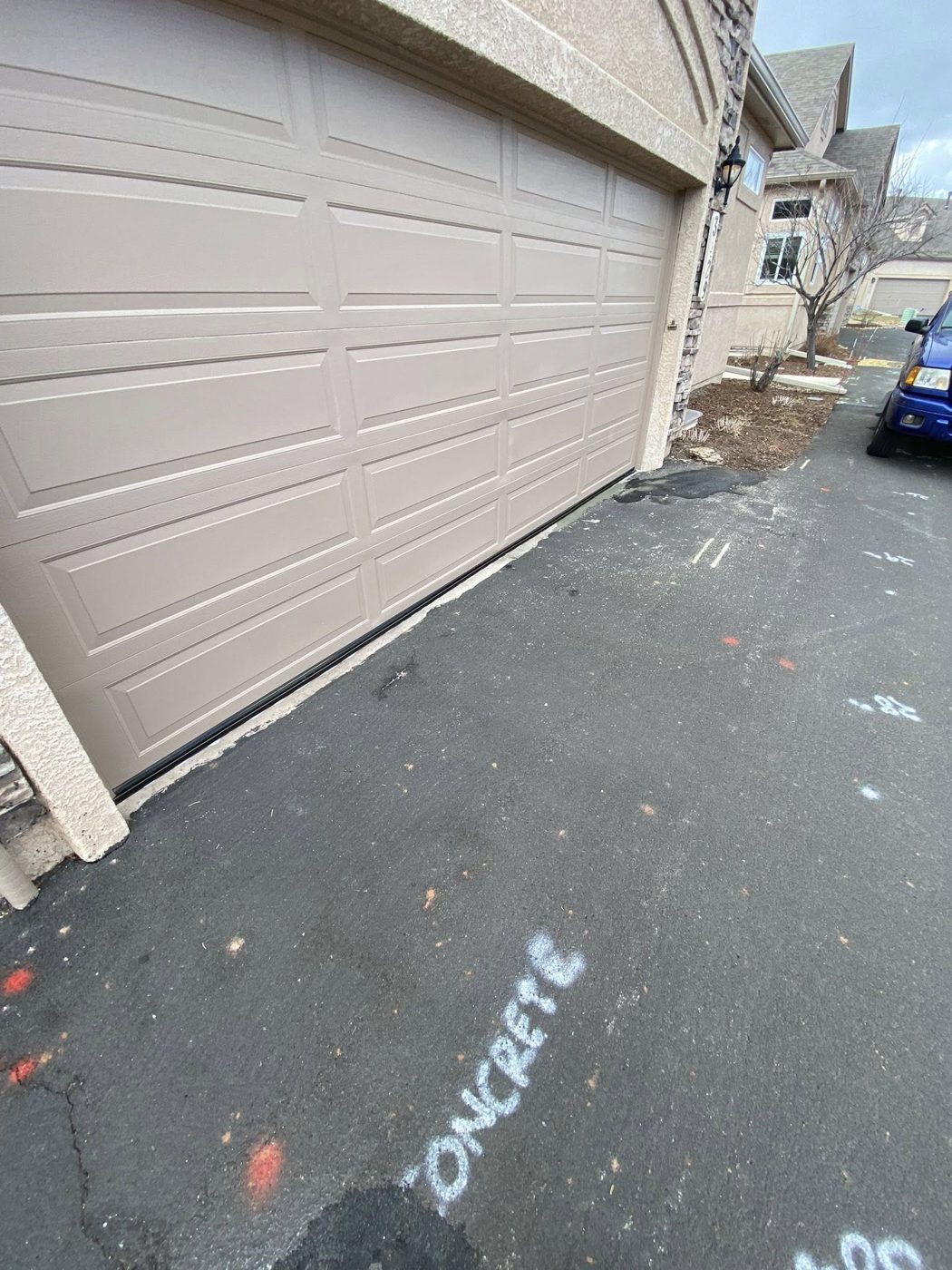 Garage door threshold gap before