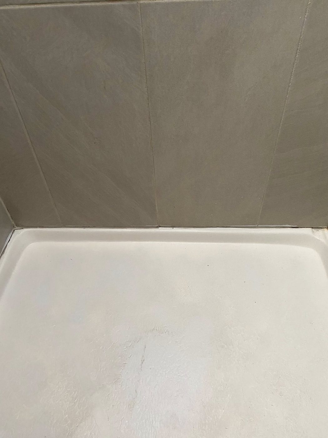 Shower corner cleaned and sealed